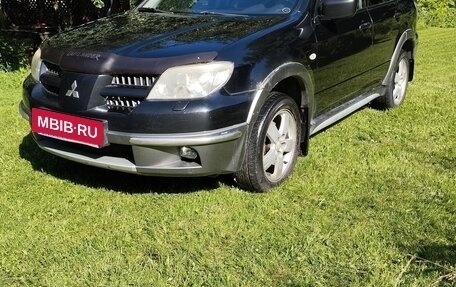 Mitsubishi Outlander III рестайлинг 3, 2004 год, 649 000 рублей, 3 фотография