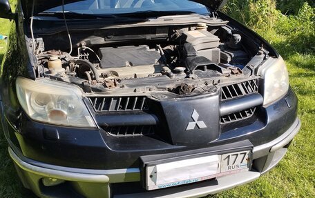 Mitsubishi Outlander III рестайлинг 3, 2004 год, 649 000 рублей, 23 фотография