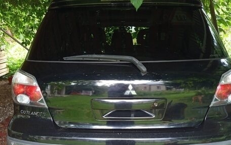 Mitsubishi Outlander III рестайлинг 3, 2004 год, 649 000 рублей, 30 фотография