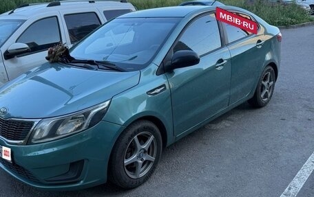 KIA Rio III рестайлинг, 2012 год, 700 000 рублей, 5 фотография