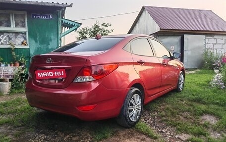 Hyundai Solaris II рестайлинг, 2011 год, 900 000 рублей, 5 фотография