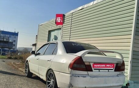 Mitsubishi Lancer VII, 1999 год, 200 000 рублей, 6 фотография