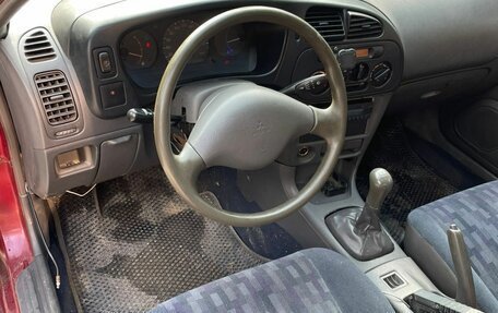 Mitsubishi Lancer VII, 1997 год, 115 000 рублей, 9 фотография