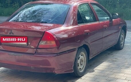 Mitsubishi Lancer VII, 1997 год, 115 000 рублей, 3 фотография