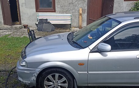 Ford Laser IV, 1999 год, 350 000 рублей, 5 фотография