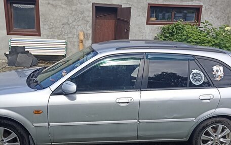 Ford Laser IV, 1999 год, 350 000 рублей, 6 фотография