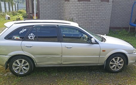 Ford Laser IV, 1999 год, 350 000 рублей, 10 фотография