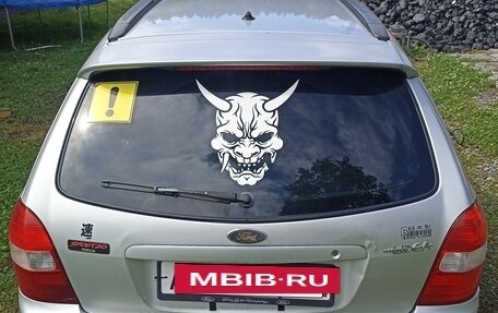 Ford Laser IV, 1999 год, 350 000 рублей, 8 фотография