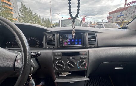 Toyota Corolla, 2005 год, 600 000 рублей, 11 фотография