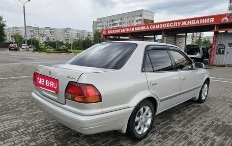 Toyota Corolla, 1997 год, 600 000 рублей, 23 фотография
