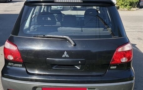 Mitsubishi Outlander III рестайлинг 3, 2005 год, 600 000 рублей, 4 фотография