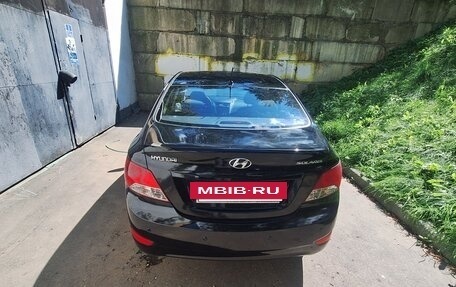 Hyundai Solaris II рестайлинг, 2013 год, 650 000 рублей, 12 фотография