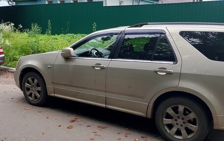 Cadillac SRX II рестайлинг, 2007 год, 1 100 000 рублей, 10 фотография
