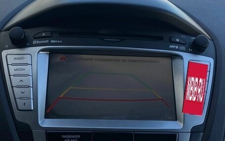 Hyundai ix35 I рестайлинг, 2012 год, 900 000 рублей, 16 фотография