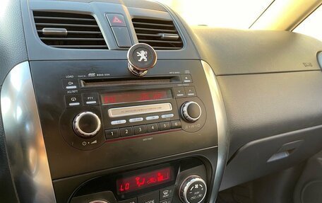 Suzuki SX4 II рестайлинг, 2010 год, 599 000 рублей, 10 фотография