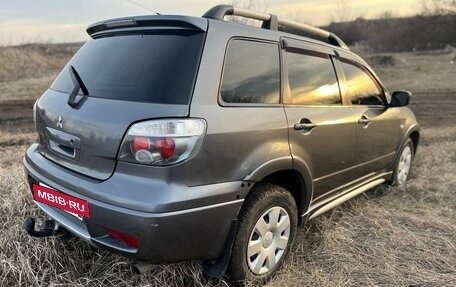 Mitsubishi Outlander III рестайлинг 3, 2006 год, 799 000 рублей, 21 фотография