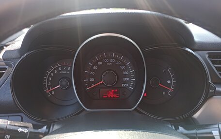 KIA Rio III рестайлинг, 2014 год, 23 фотография