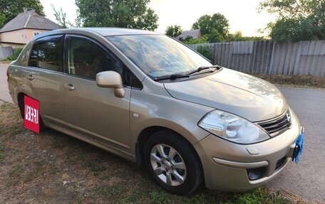 Nissan Tiida, 2010 год, 850 000 рублей, 2 фотография