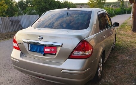 Nissan Tiida, 2010 год, 850 000 рублей, 4 фотография