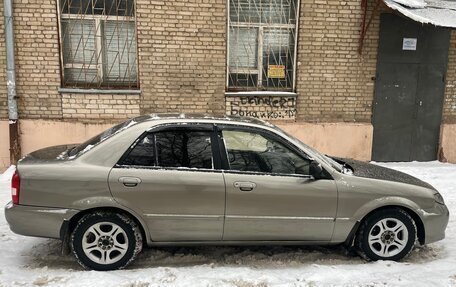 Mazda 323, 2000 год, 300 000 рублей, 12 фотография