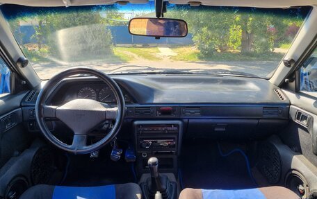 Mazda 323, 1994 год, 240 000 рублей, 11 фотография