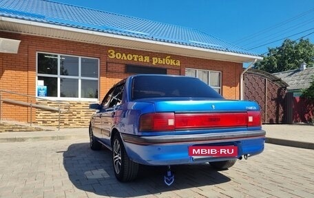 Mazda 323, 1994 год, 240 000 рублей, 6 фотография