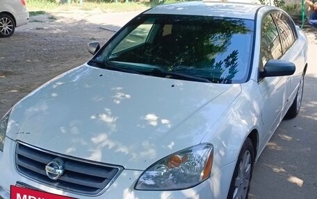 Nissan Altima III (L31) рестайлинг, 2001 год, 350 000 рублей, 5 фотография