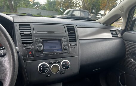 Nissan Tiida, 2010 год, 670 000 рублей, 13 фотография