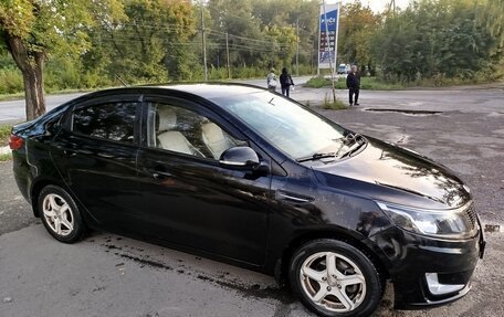 KIA Rio III рестайлинг, 2014 год, 950 000 рублей, 3 фотография