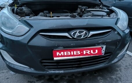 Hyundai Solaris II рестайлинг, 2011 год, 450 000 рублей, 23 фотография