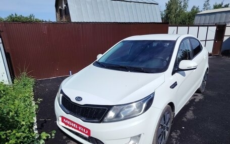 KIA Rio III рестайлинг, 2012 год, 670 000 рублей, 10 фотография