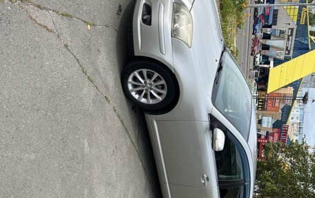Toyota Avensis III рестайлинг, 2007 год, 750 000 рублей, 3 фотография