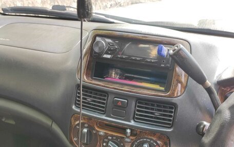 Toyota Raum I, 2000 год, 390 000 рублей, 12 фотография