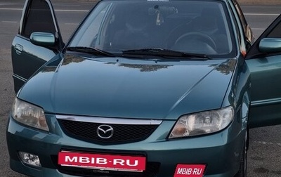 Mazda 323, 2003 год, 1 фотография
