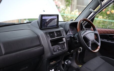 Mitsubishi Pajero iO, 2000 год, 850 000 рублей, 28 фотография