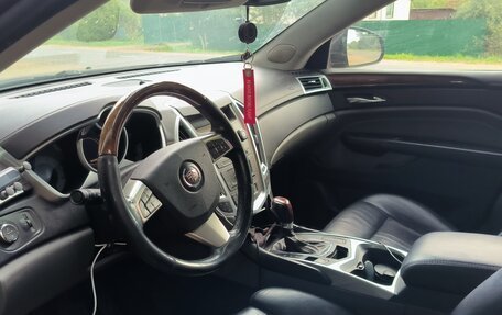 Cadillac SRX II рестайлинг, 2010 год, 800 000 рублей, 2 фотография