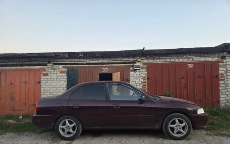 Mitsubishi Mirage VI рестайлинг, 1999 год, 160 000 рублей, 2 фотография