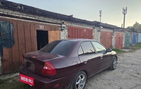 Mitsubishi Mirage VI рестайлинг, 1999 год, 160 000 рублей, 3 фотография