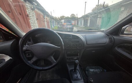 Mitsubishi Mirage VI рестайлинг, 1999 год, 160 000 рублей, 5 фотография