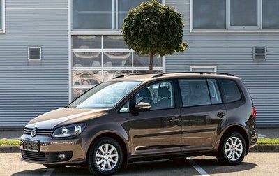 Volkswagen Touran III, 2011 год, 995 000 рублей, 1 фотография