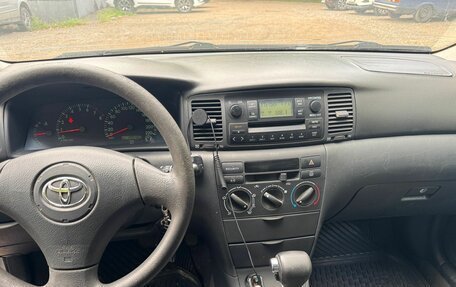 Toyota Corolla, 2004 год, 600 000 рублей, 4 фотография