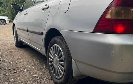 Toyota Corolla, 2004 год, 600 000 рублей, 7 фотография