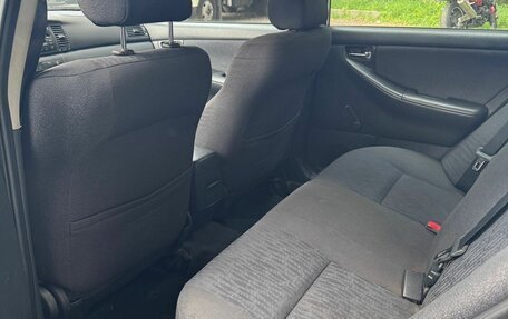 Toyota Corolla, 2004 год, 600 000 рублей, 10 фотография