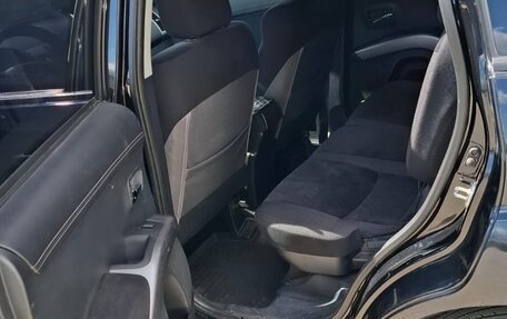 Mitsubishi Outlander III рестайлинг 3, 2011 год, 1 250 000 рублей, 13 фотография
