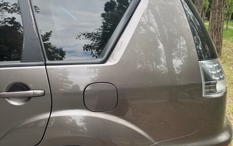 Mitsubishi Outlander III рестайлинг 3, 2011 год, 1 000 000 рублей, 8 фотография