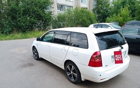 Toyota Corolla, 2004 год, 700 000 рублей, 11 фотография