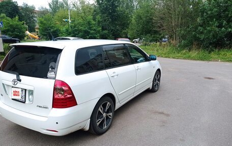Toyota Corolla, 2004 год, 700 000 рублей, 22 фотография