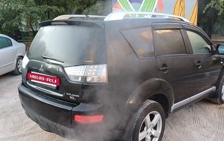 Mitsubishi Outlander III рестайлинг 3, 2007 год, 1 200 000 рублей, 4 фотография