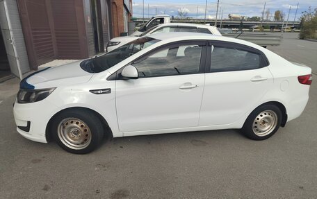 KIA Rio III рестайлинг, 2012 год, 830 000 рублей, 2 фотография