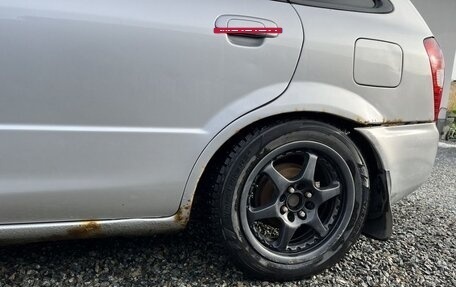 Mazda Familia Y11, 2001 год, 250 000 рублей, 10 фотография